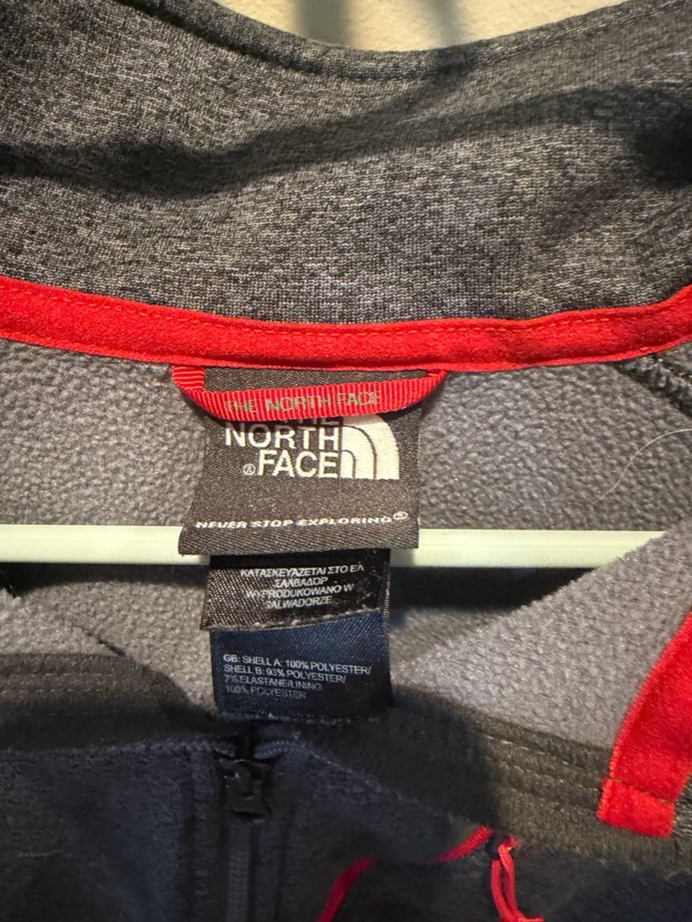 The North Face Men’s Gray Fleece Jacket with Red Trim